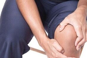Self-massage of the knee joint to treat arthritis